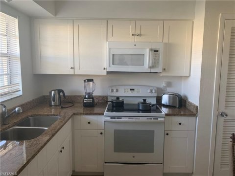 Poinciana Village Naples Real Estate